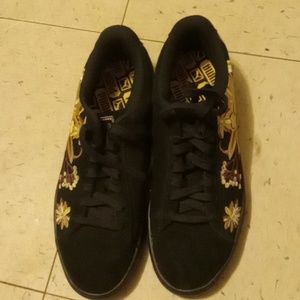 Black and gold suede Puma